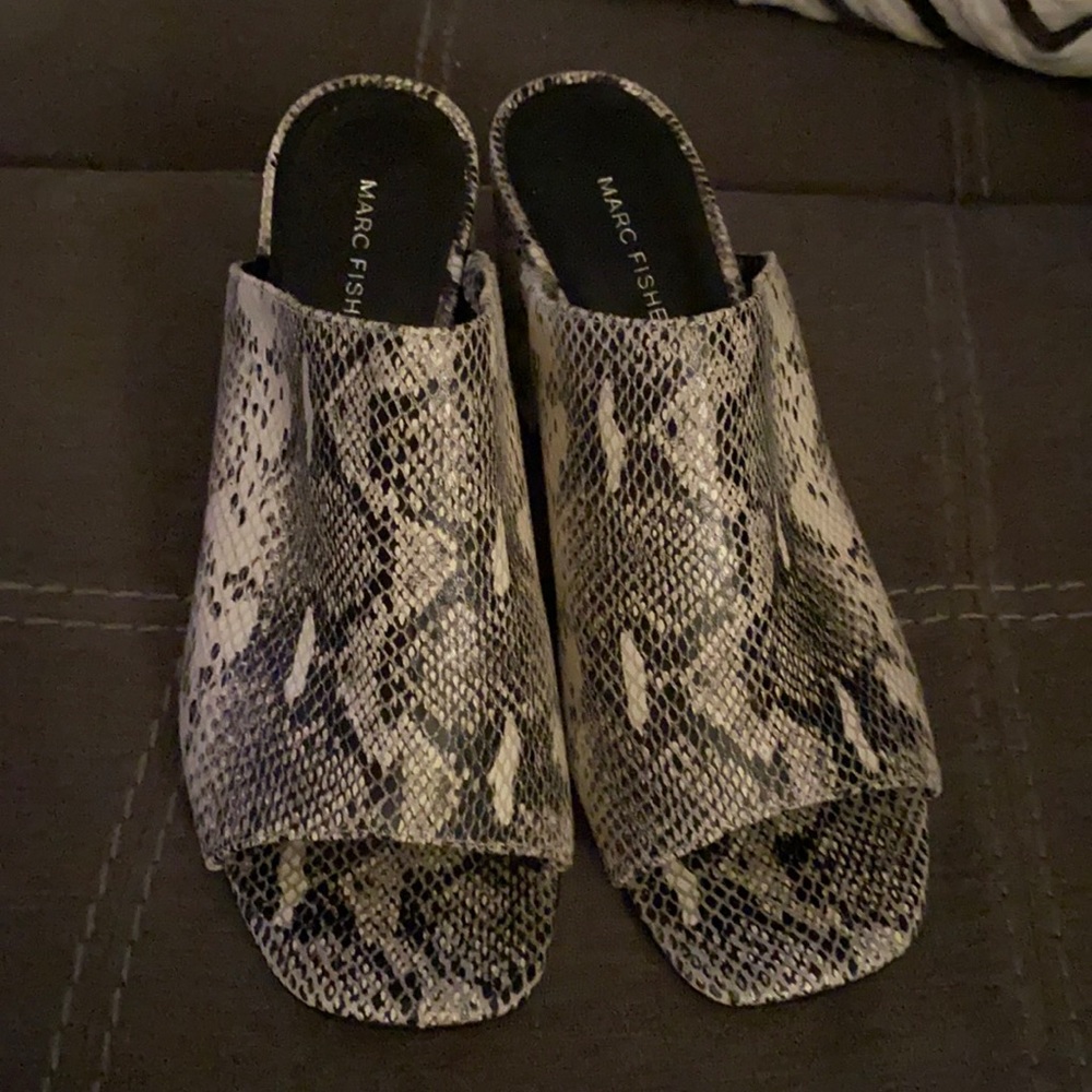 Brand new.  Beautiful and stylish!  Never worn